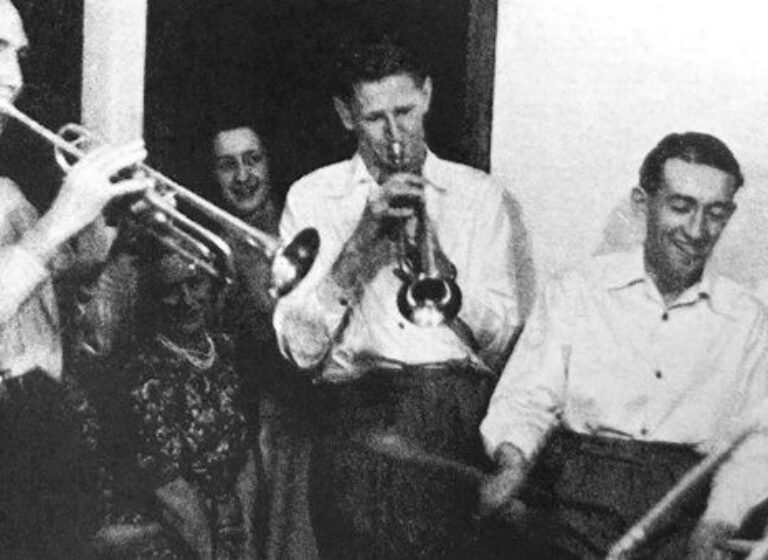 Black-and-white photo of musicians playing together during a jazz jam